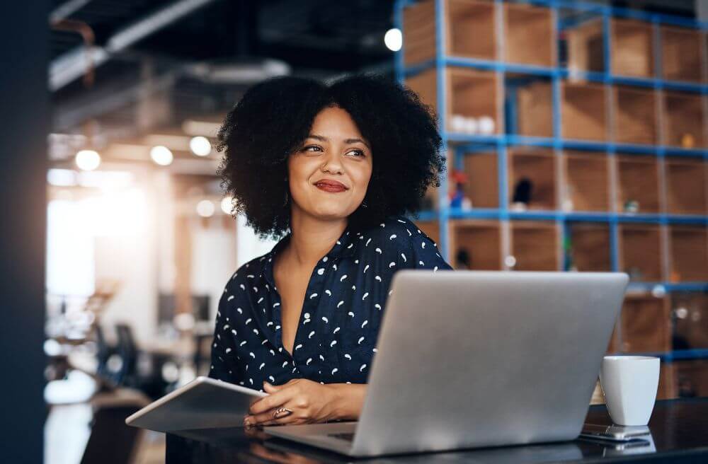 Woman sat with laptop